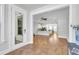 Sunroom offering hardwood floors and view into the living room and kitchen at 234 Oak Park St, Summerville, SC 29486