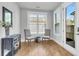 Sunroom with hardwood floors and access to backyard at 234 Oak Park St, Summerville, SC 29486