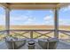 Relaxing deck with marsh views and comfortable seating at 2618 Raven Dr, Sullivans Island, SC 29482