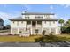 Charming two-story home with metal roof and expansive yard at 2618 Raven Dr, Sullivans Island, SC 29482