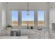 Farmhouse sink with stunning views from the kitchen window at 2618 Raven Dr, Sullivans Island, SC 29482