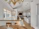 Open floor plan with kitchen, living area, and dining space at 2618 Raven Dr, Sullivans Island, SC 29482