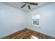 Small bedroom with hardwood floors and a window with blinds at 2749 E Surrey Dr, North Charleston, SC 29405