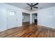 Bright living room with hardwood floors and a ceiling fan at 2749 E Surrey Dr, North Charleston, SC 29405