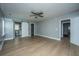 Spacious main bedroom with light wood flooring and a barn door at 2749 E Surrey Dr, North Charleston, SC 29405