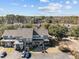 Aerial view of houses with surrounding trees and pond at 2971 Treadwell St St, Mount Pleasant, SC 29466