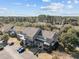 Aerial view of houses with surrounding trees and pond at 2971 Treadwell St St, Mount Pleasant, SC 29466