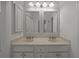 Double vanity bathroom with granite countertop and large mirrors at 2971 Treadwell St St, Mount Pleasant, SC 29466