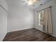 Simple bedroom with dark wood floors and window at 2971 Treadwell St St, Mount Pleasant, SC 29466