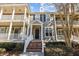 Attractive townhome with a classic facade and brick steps leading to the entrance at 2971 Treadwell St St, Mount Pleasant, SC 29466