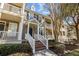 Two story home with wrap-around porch and brick steps at 2971 Treadwell St St, Mount Pleasant, SC 29466
