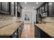Updated kitchen featuring granite counters and dark wood cabinets at 2971 Treadwell St St, Mount Pleasant, SC 29466