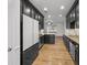 Modern kitchen with dark cabinets, stainless steel appliances and hardwood floors at 2971 Treadwell St St, Mount Pleasant, SC 29466