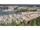 Aerial view of houses under construction and surrounding community at 311 Calm Water Way, Summerville, SC 29486