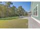 Expansive backyard with patio and lush greenery at 311 Calm Water Way, Summerville, SC 29486