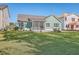 Large backyard with green grass and home exterior at 311 Calm Water Way, Summerville, SC 29486