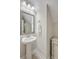 Small bathroom with pedestal sink and decorative mirror at 311 Calm Water Way, Summerville, SC 29486