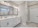 Elegant bathroom with double vanity, large mirror, and tile flooring at 311 Calm Water Way, Summerville, SC 29486