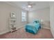 Small bedroom with twin bed, shelf, and window at 311 Calm Water Way, Summerville, SC 29486
