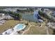 Aerial view of community pool, clubhouse, and walking paths at 311 Calm Water Way, Summerville, SC 29486