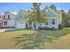 House exterior with green siding and landscaping at 311 Calm Water Way, Summerville, SC 29486