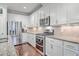 Well-equipped kitchen featuring stainless steel appliances and granite countertops at 311 Calm Water Way, Summerville, SC 29486