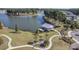 Aerial view of lakefront property with walking paths and gazebo at 311 Calm Water Way, Summerville, SC 29486