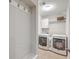 Laundry room with washer, dryer, and storage at 311 Calm Water Way, Summerville, SC 29486