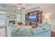 Comfortable living room with a large sectional sofa and a built-in entertainment center at 311 Calm Water Way, Summerville, SC 29486