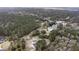 A beautiful new home is surrounded by natural beauty, pond, and lush trees at 3324 Westphal Dr, Johns Island, SC 29455