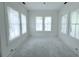 Bright bedroom with three windows and white walls at 3324 Westphal Dr, Johns Island, SC 29455