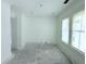 Simple bedroom with white walls and a door at 3324 Westphal Dr, Johns Island, SC 29455