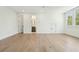 Bright, airy bedroom with light hardwood floors, white walls, and ample natural light at 3324 Westphal Dr, Johns Island, SC 29455