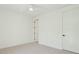 Neutral bedroom features a ceiling fan, white trim, and an adjacent doorway at 3324 Westphal Dr, Johns Island, SC 29455