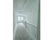 White hallway with stairs and natural light at 3324 Westphal Dr, Johns Island, SC 29455