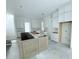 Kitchen with an island and white cabinets at 3324 Westphal Dr, Johns Island, SC 29455