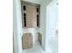 Modern kitchen with brown cabinets and glass-front upper cabinets at 3324 Westphal Dr, Johns Island, SC 29455