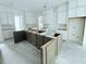 Modern kitchen with white cabinets and a large island at 3324 Westphal Dr, Johns Island, SC 29455