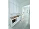 White kitchen cabinets and countertops under construction at 3324 Westphal Dr, Johns Island, SC 29455
