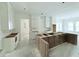 Modern kitchen with white cabinets and a large island at 3324 Westphal Dr, Johns Island, SC 29455