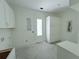 Bright laundry room with built-in cabinets and a door at 3324 Westphal Dr, Johns Island, SC 29455