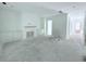 Spacious living room with white walls, fireplace, and built-in cabinets at 3324 Westphal Dr, Johns Island, SC 29455