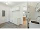 Bright mudroom featuring built-in bench with storage and view to the kitchen at 3324 Westphal Dr, Johns Island, SC 29455