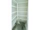 Large pantry with white corner shelving at 3324 Westphal Dr, Johns Island, SC 29455