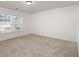 Spacious bedroom with neutral carpeting and large windows at 346 Bradley Bend Drive, Moncks Corner, SC 29461