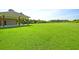 Large grassy area with a community pavilion in background at 346 Bradley Bend Drive, Moncks Corner, SC 29461
