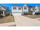 Two-story house with gray siding, white garage door, and a well-manicured lawn at 346 Bradley Bend Drive, Moncks Corner, SC 29461