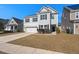 Two-story house with gray siding, white garage door, and a neat lawn at 346 Bradley Bend Drive, Moncks Corner, SC 29461