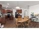 Kitchen with island, wood cabinets, and dining area at 346 Bradley Bend Drive, Moncks Corner, SC 29461