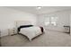 Main bedroom with carpeted floor and large windows at 346 Bradley Bend Drive, Moncks Corner, SC 29461